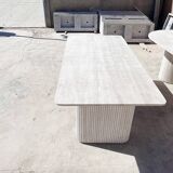 Dining table in travertine