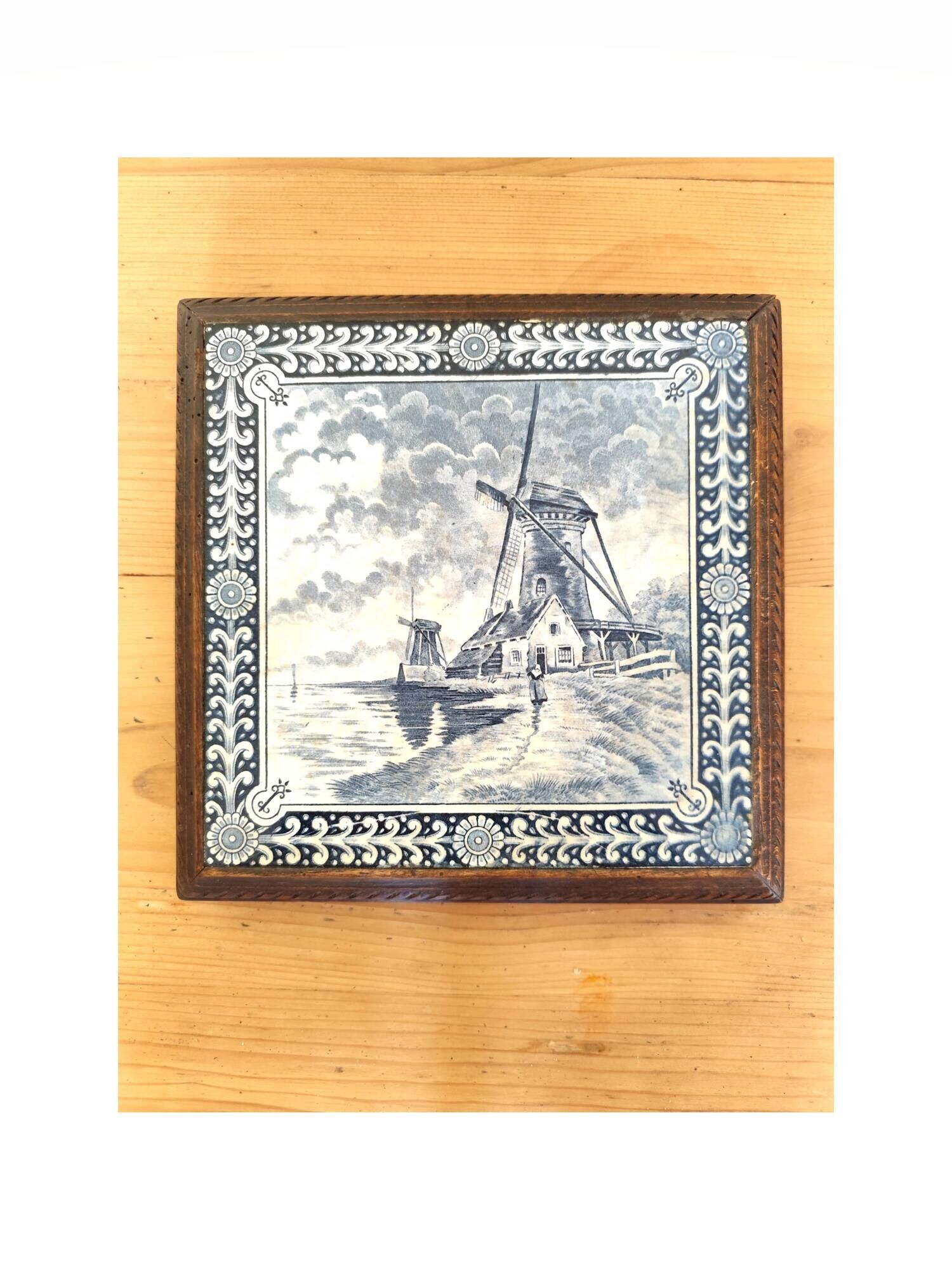 Ceramic tile trivet and wooden frame with Dutch windmill.