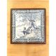 Ceramic tile trivet and wooden frame with Dutch windmill.