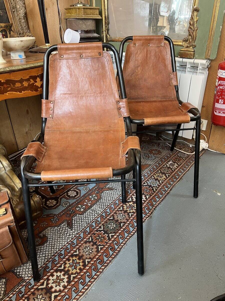 Pair of Metal and Leather Chairs, after Charlotte Perriand for Les Arcs, circa 1960.