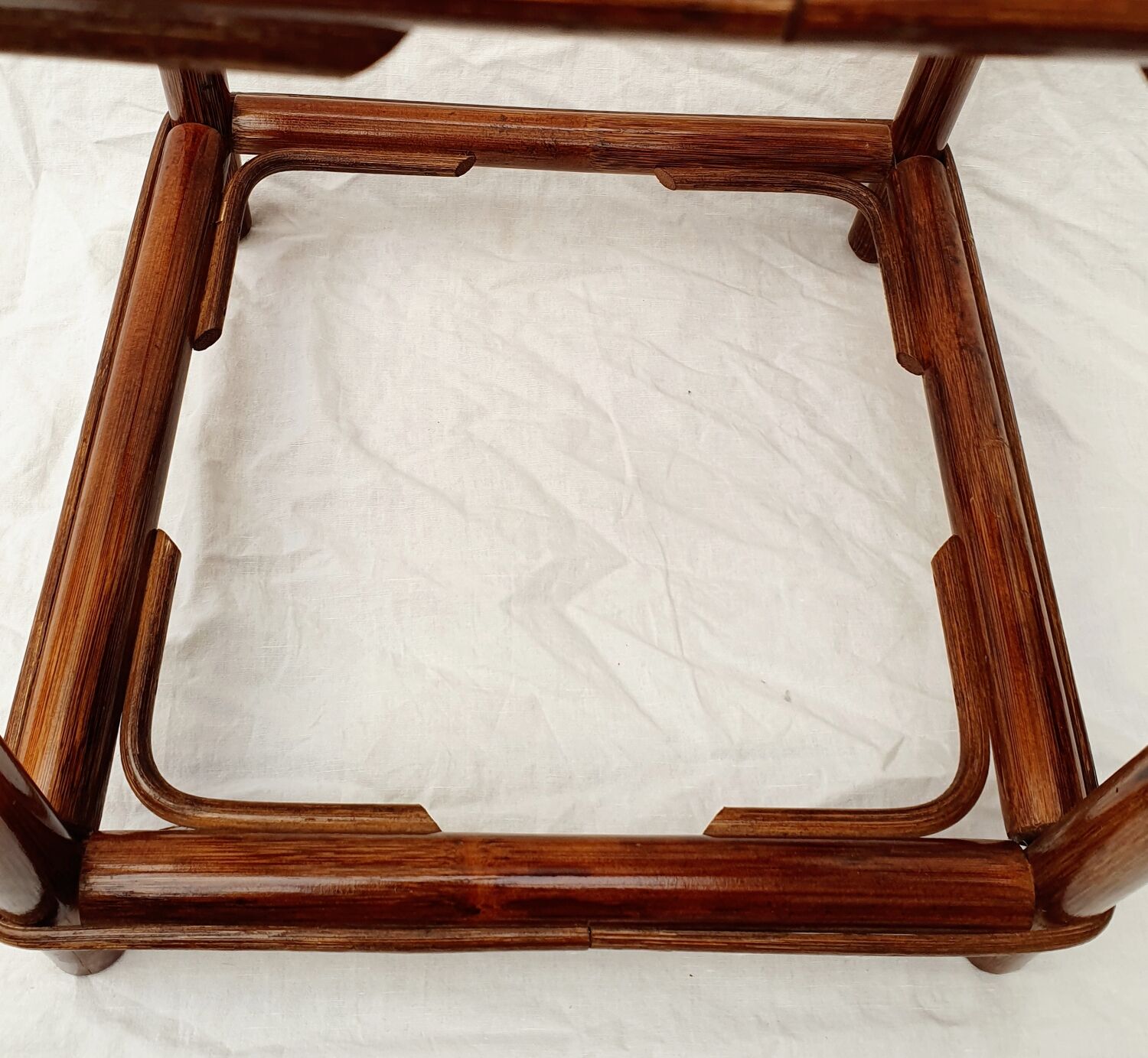 Rattan and smoked glass side table