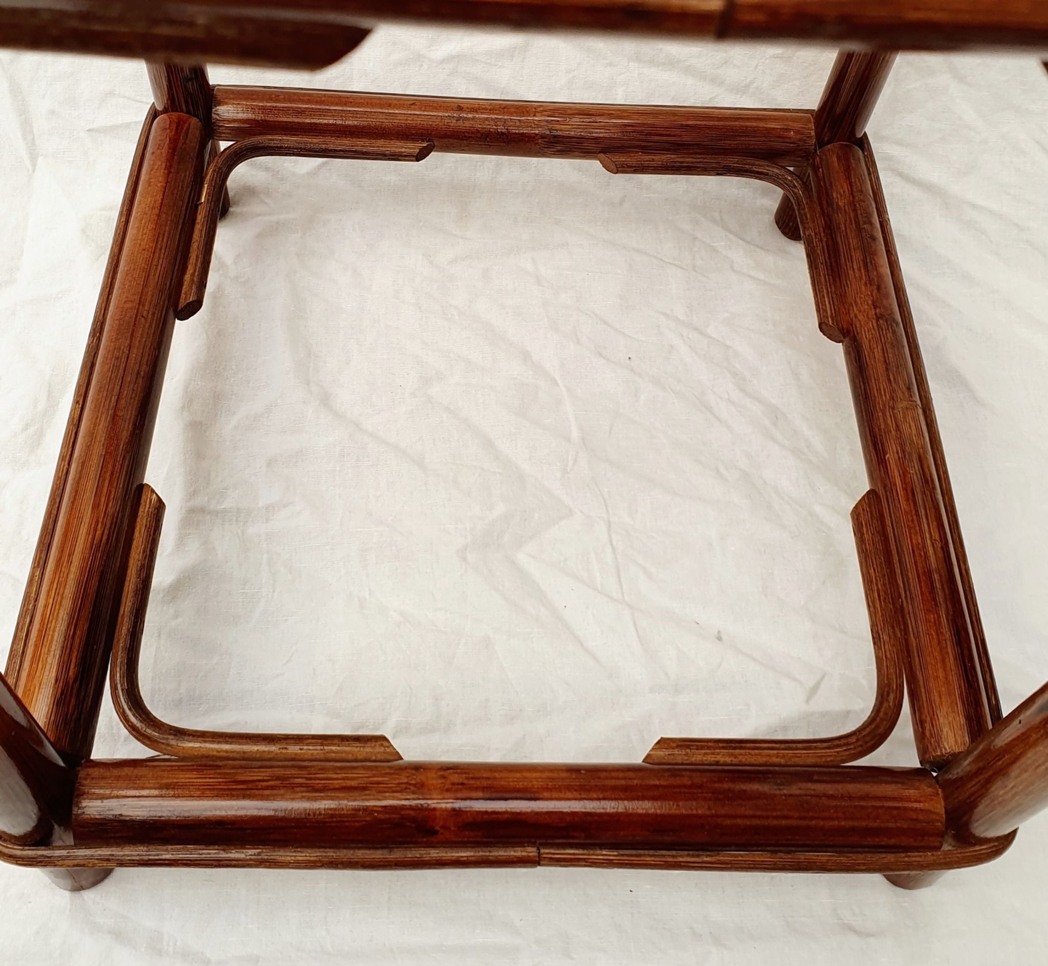 Rattan and smoked glass side table