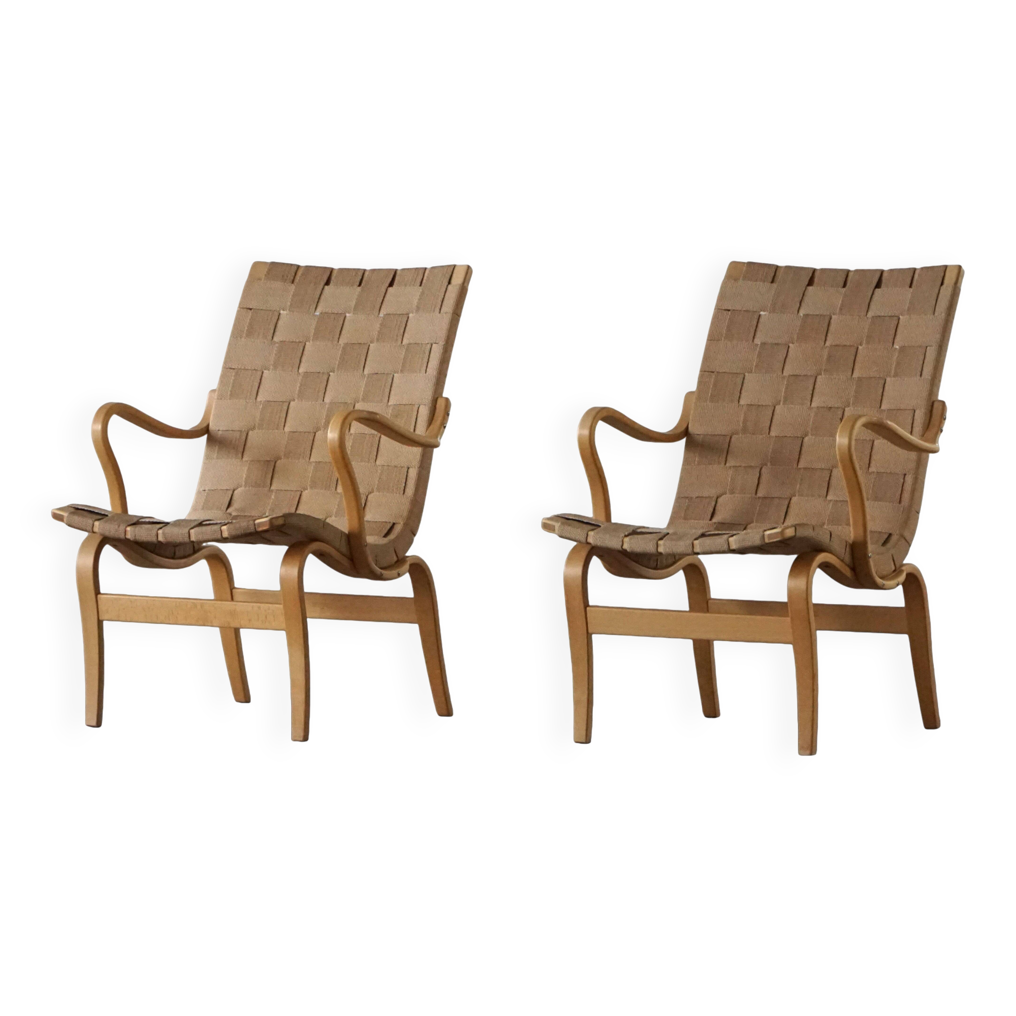 Pair of Swedish armchairs from the mid-century by Bruno Mathsson, model "Eva", 1960s.