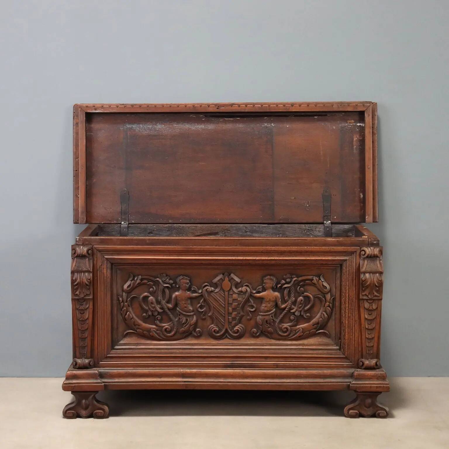 Walnut chest with baroque carvings