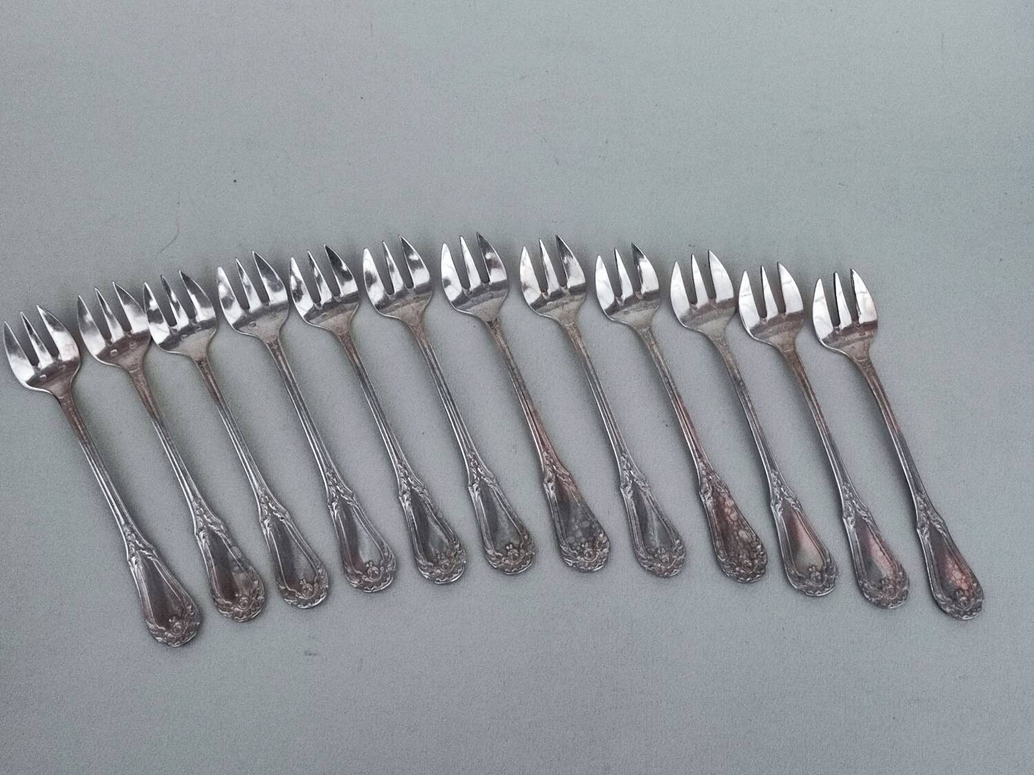12 silverplated cake forks