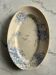 Oval blue presentation plate with birds.
