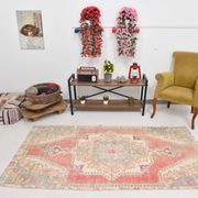 Tapis turc médaillon rouge