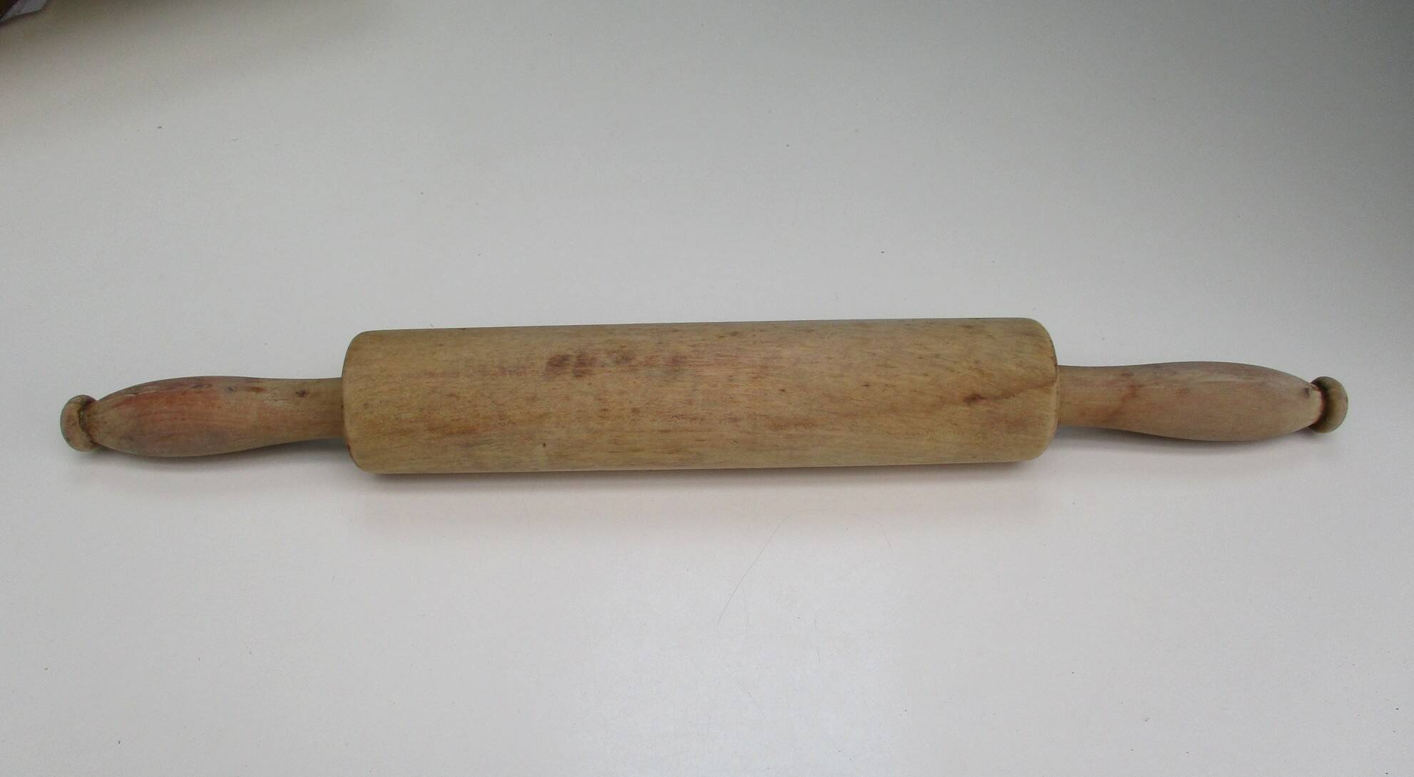 Vintage rolling pin, made of wood.