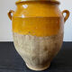 Old yellow glazed terracotta grease pot south west France
