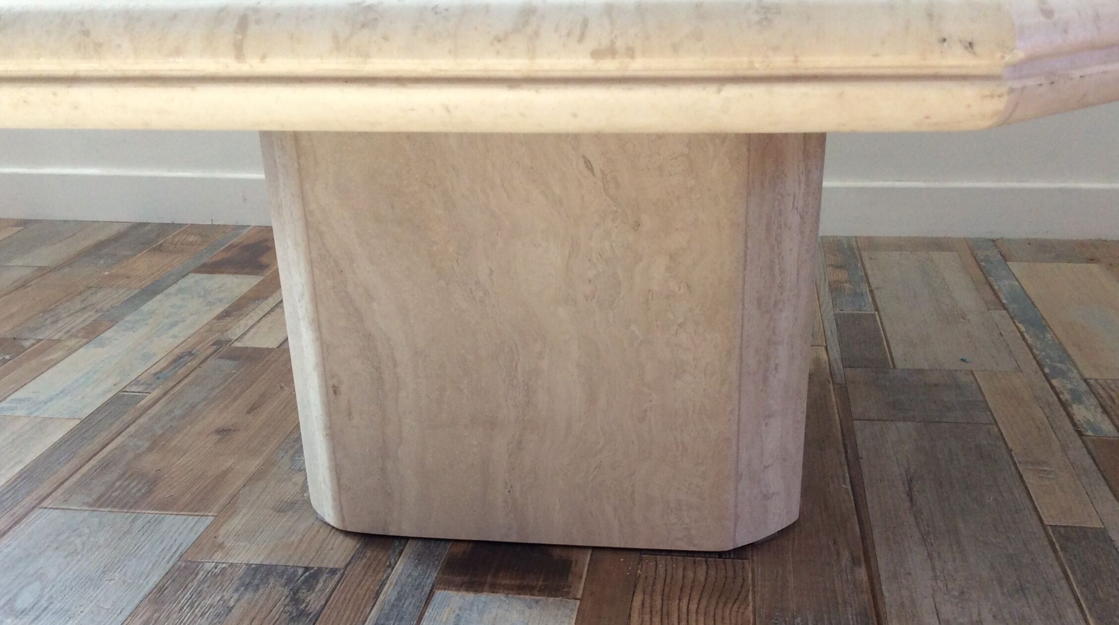Octagonal coffee table in travertine