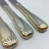 12 silver metal knives.