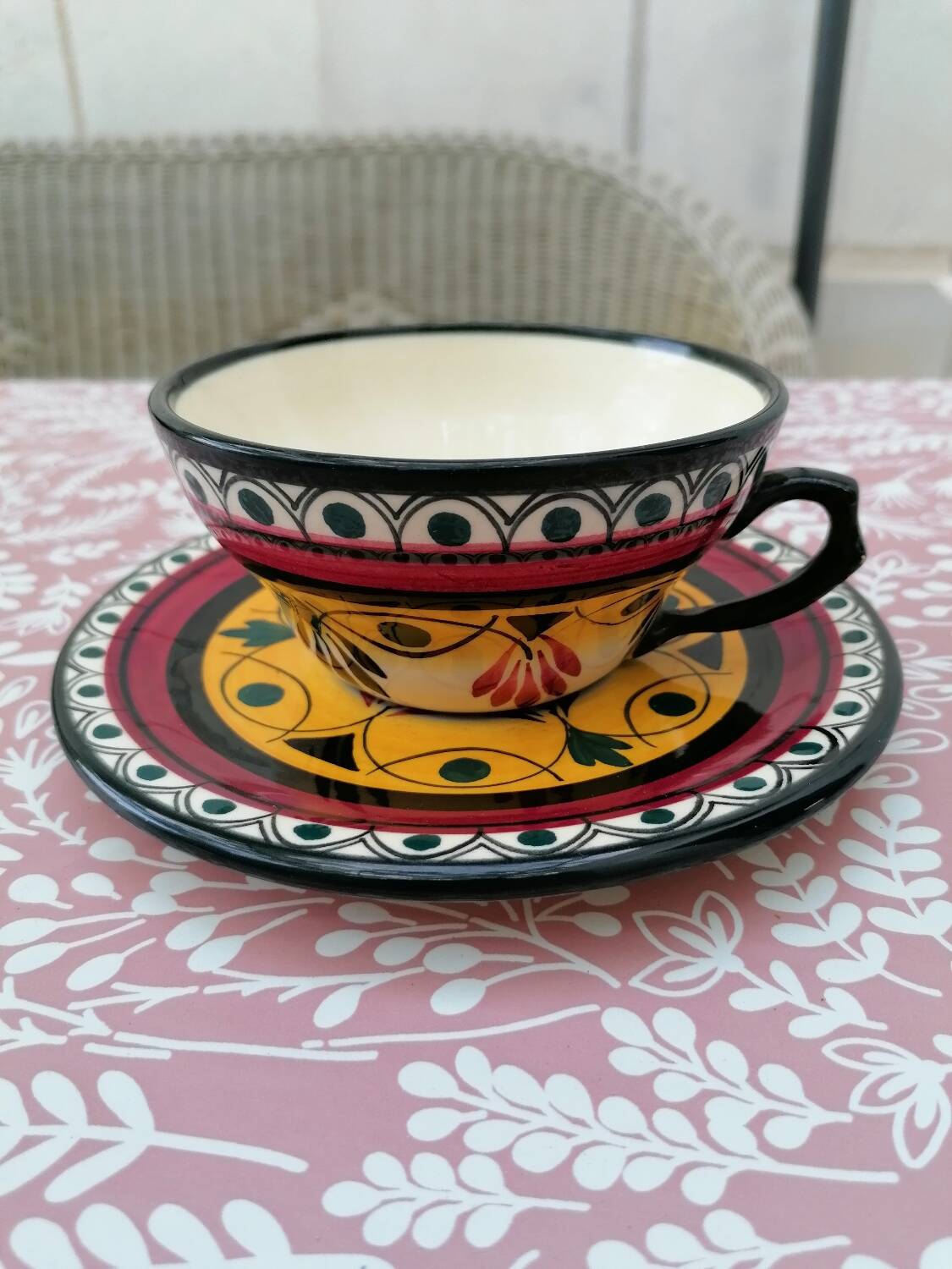 Hand-painted Breton earthenware cup and saucer from St Jean de Bretagne