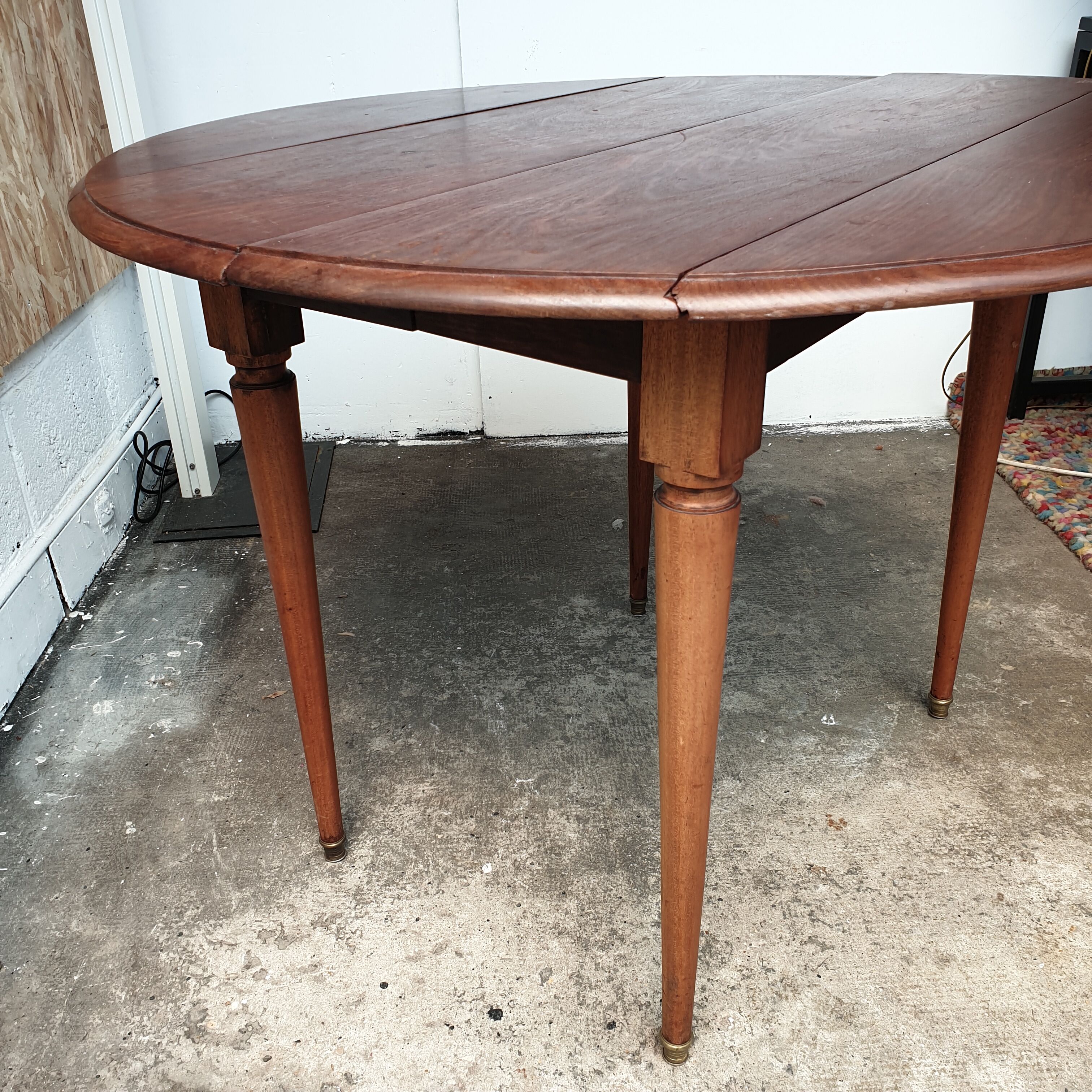 Old mahogany-shuttered round table
