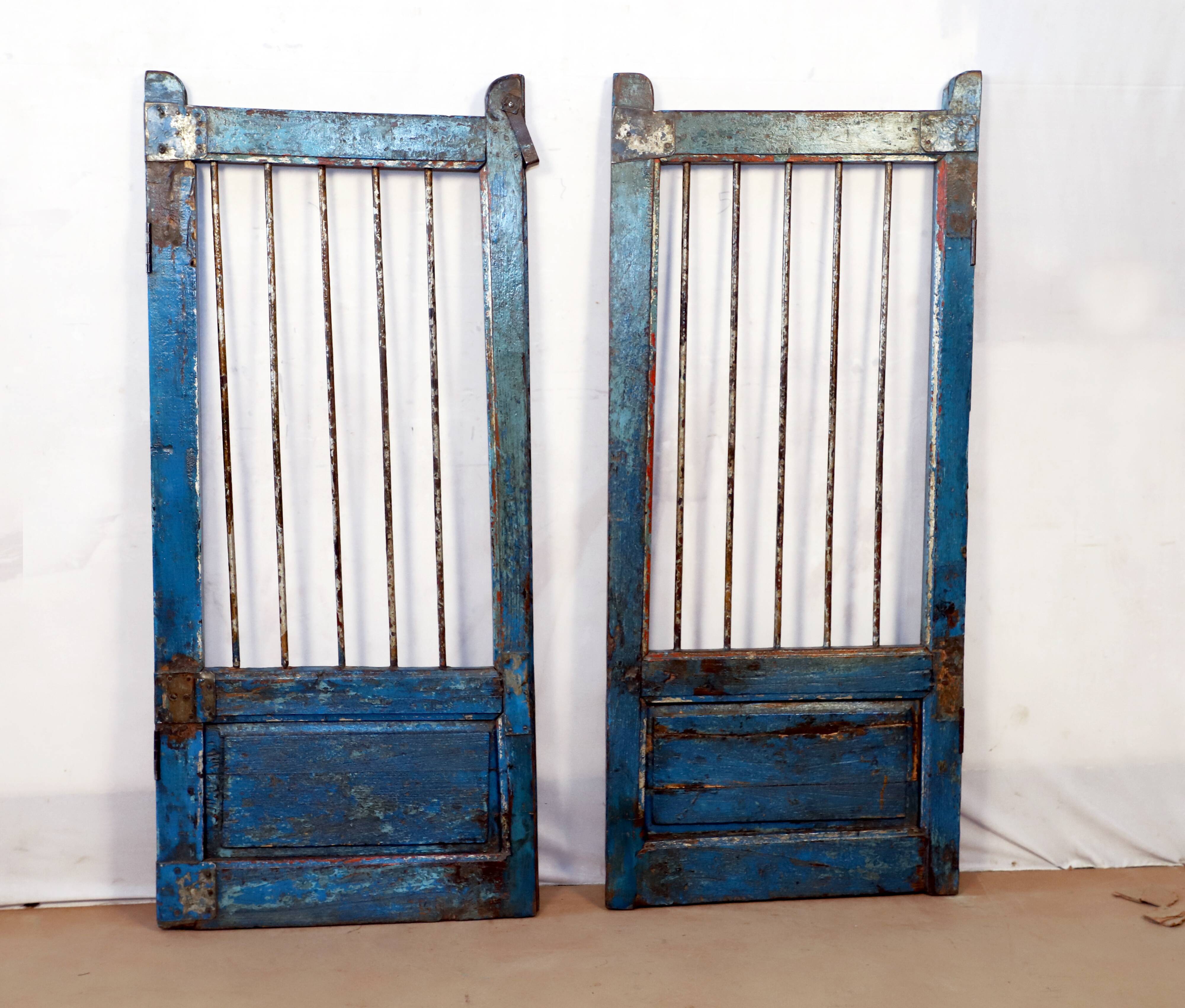 Old burmese teak gate with openwork wrought iron panels