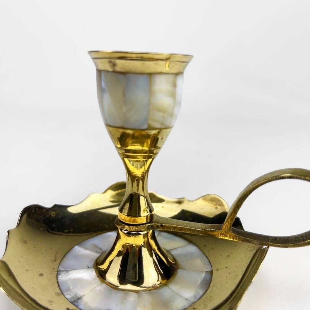 Duo of vintage brass and mother-of-pearl cellar rat candlesticks