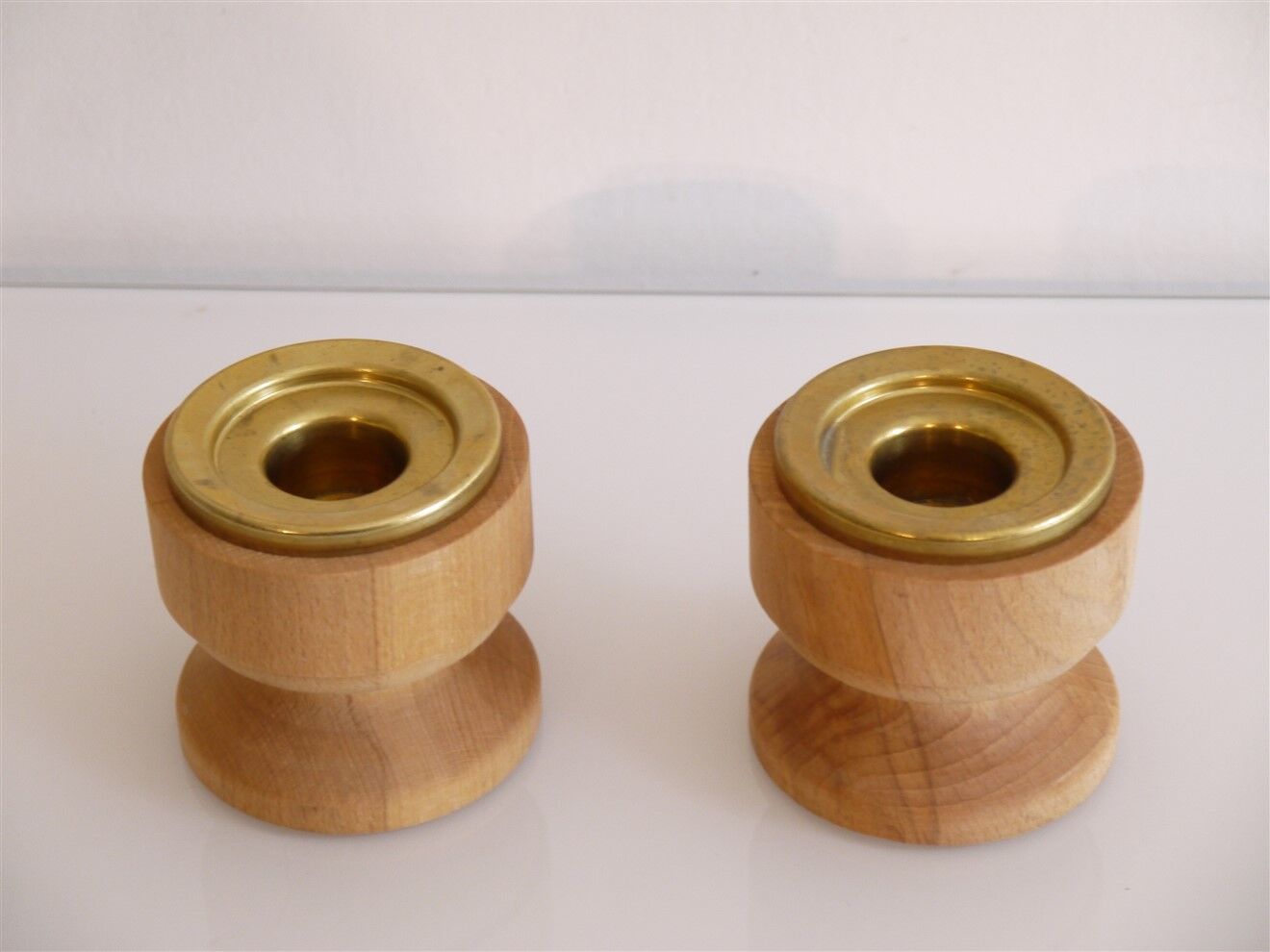 Pair of vintage candle holders in wood and brass