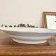 Hollow gold and white serving dish