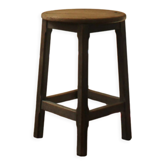 Large antique rustic stool in raw wood