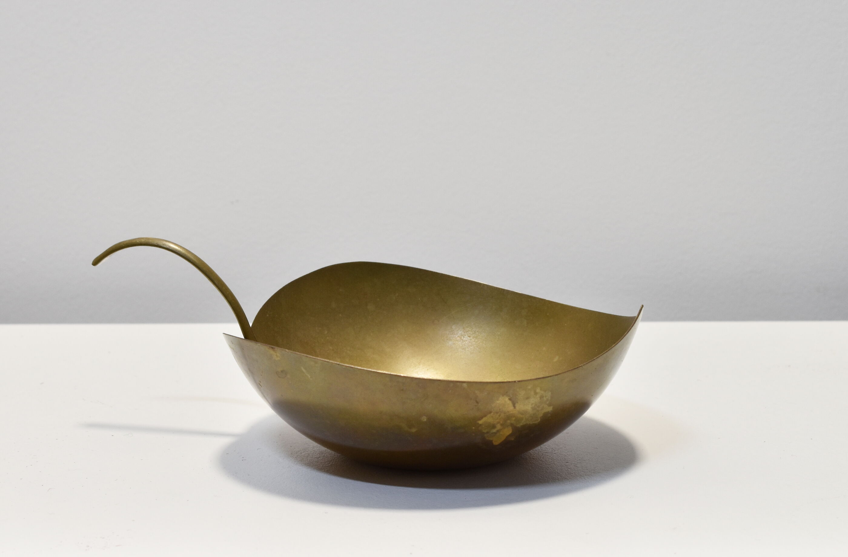 Empty brass leaf pocket