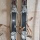 Old skis wooden and its pair of sticks