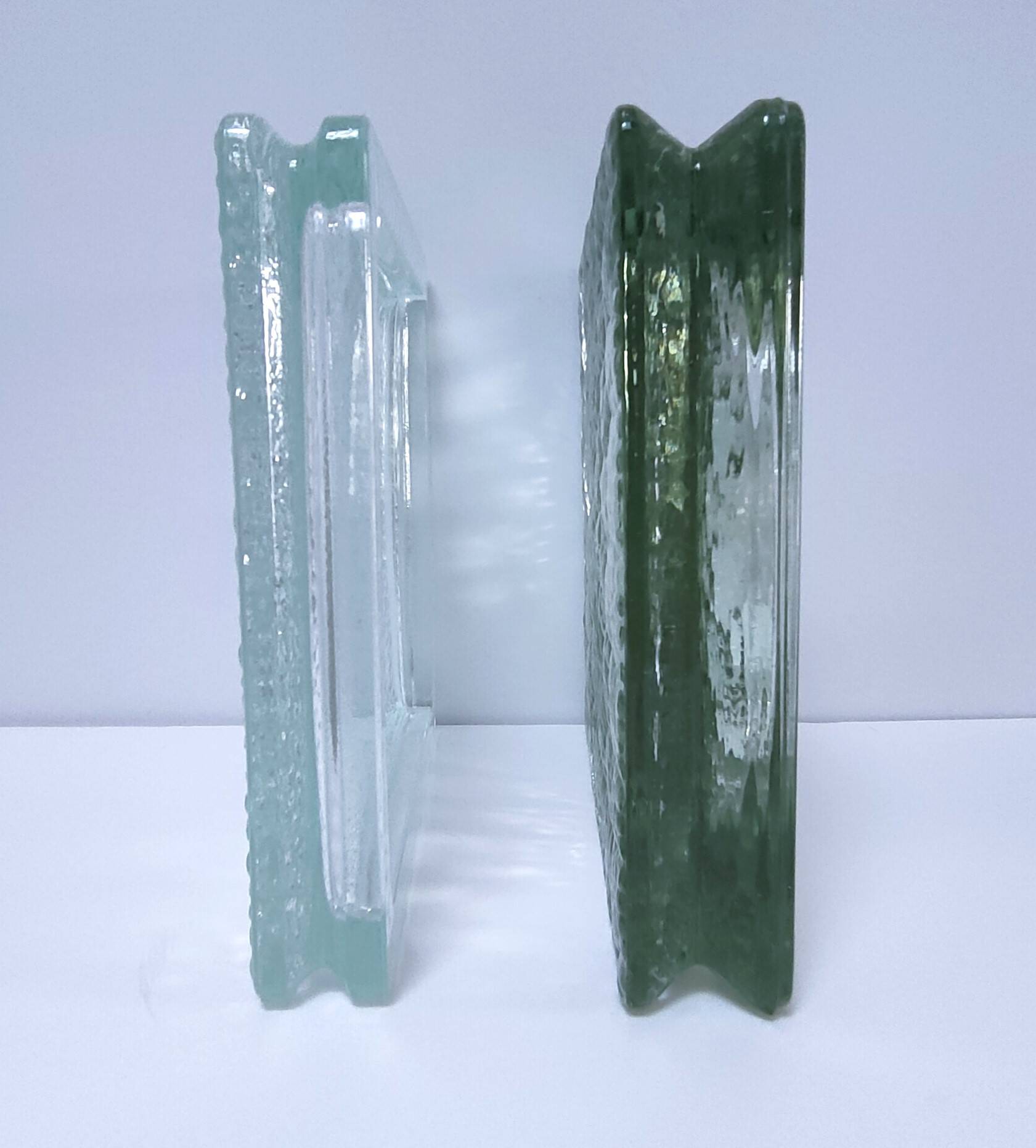 Two designer glass paving pockets