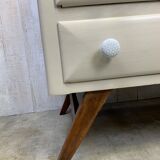 Dresser with compass feet