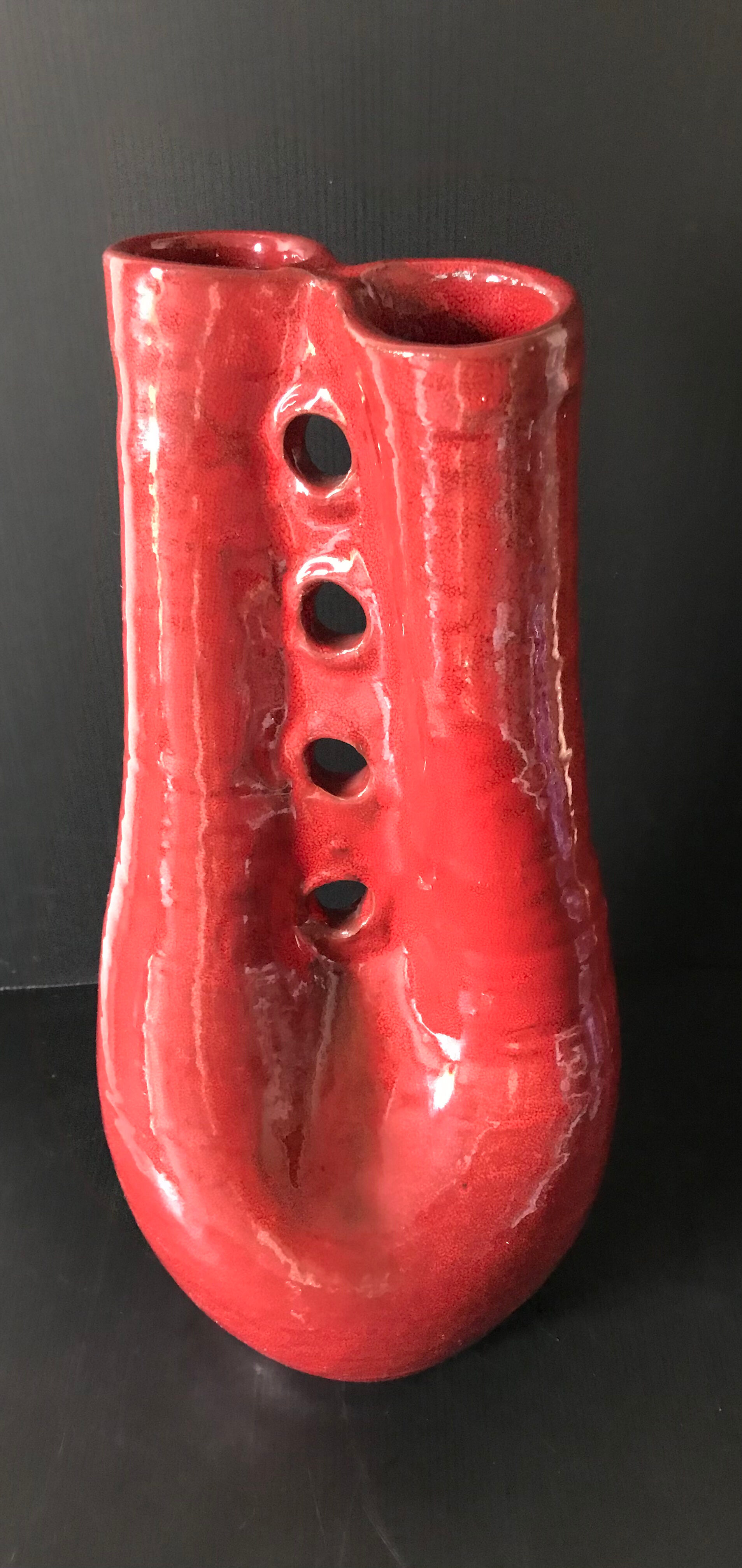 Red ceramic vase