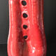 Red ceramic vase