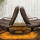 Pair of Norwegian swivel armchairs in leather and beech from the 1970s.