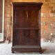 Large secretary with a drop-down front, Restoration style in flamed mahogany and marble.