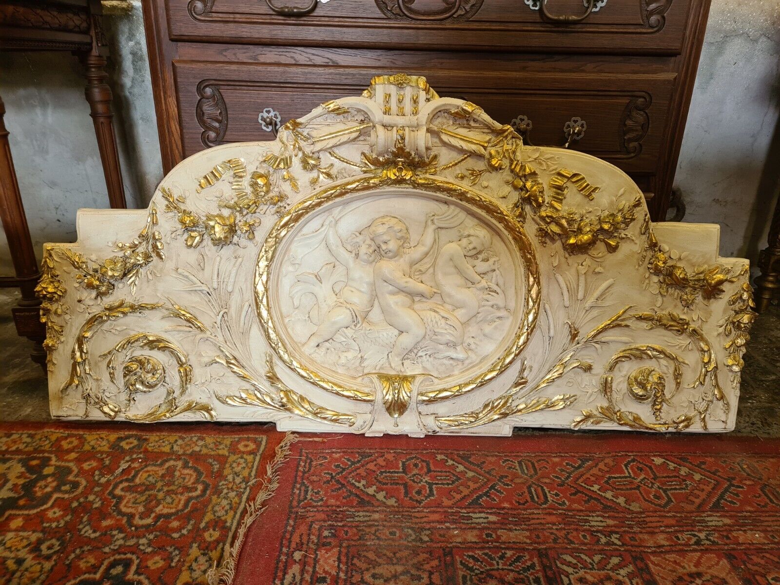 pediment panel with stucco angels