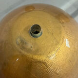 Vintage Italian design coffee table with a glass top and gold base, dating from the 1980s.