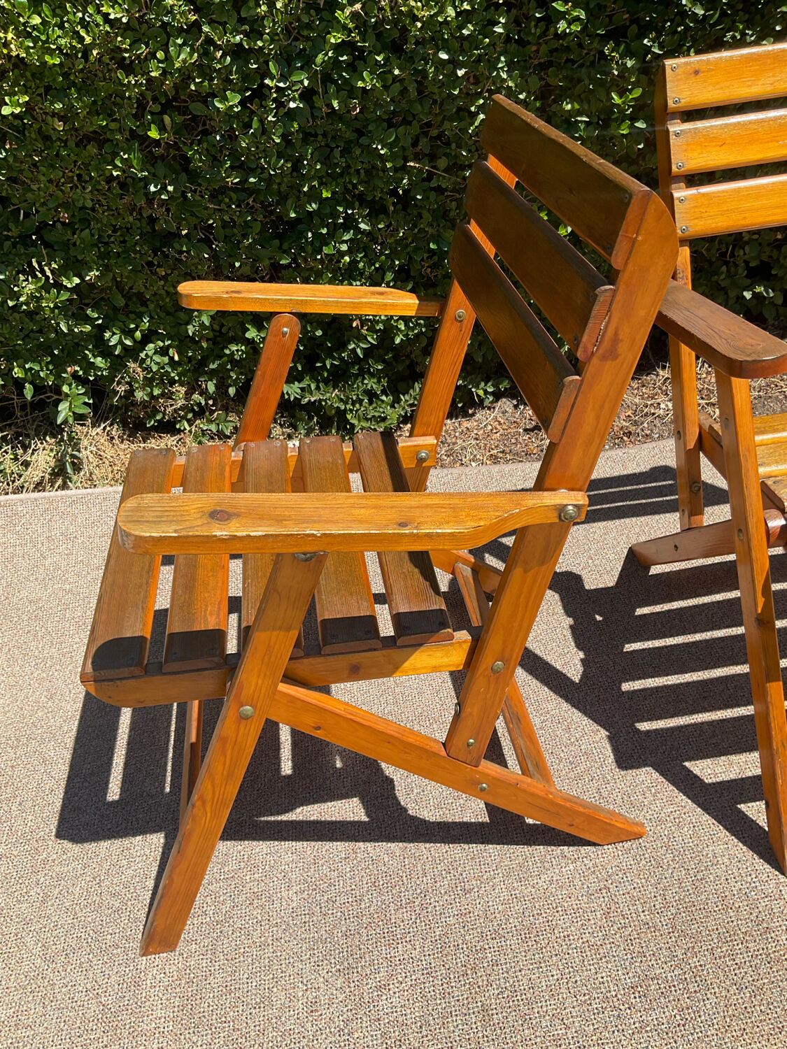 Pair of vintage wooden folding armchairs
