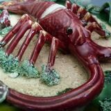 Barbotine earthenware plate