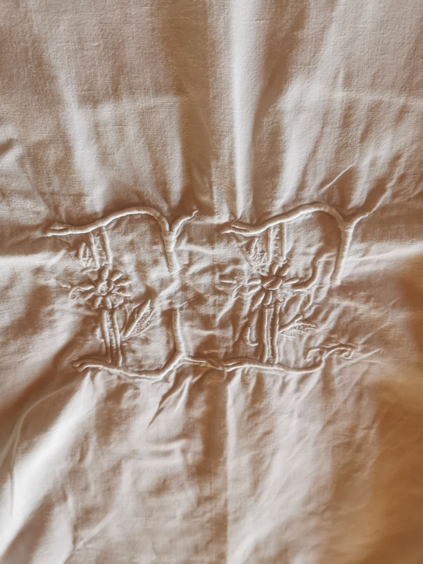 Old monogrammed fabric