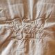Old monogrammed fabric