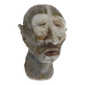 Face sculpture in polychrome earth and plaster, cabinet of curiosities. Ph Monaux. Ariège artist