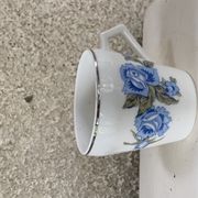 Coffee service in white porcelain pattern pink blue art deco