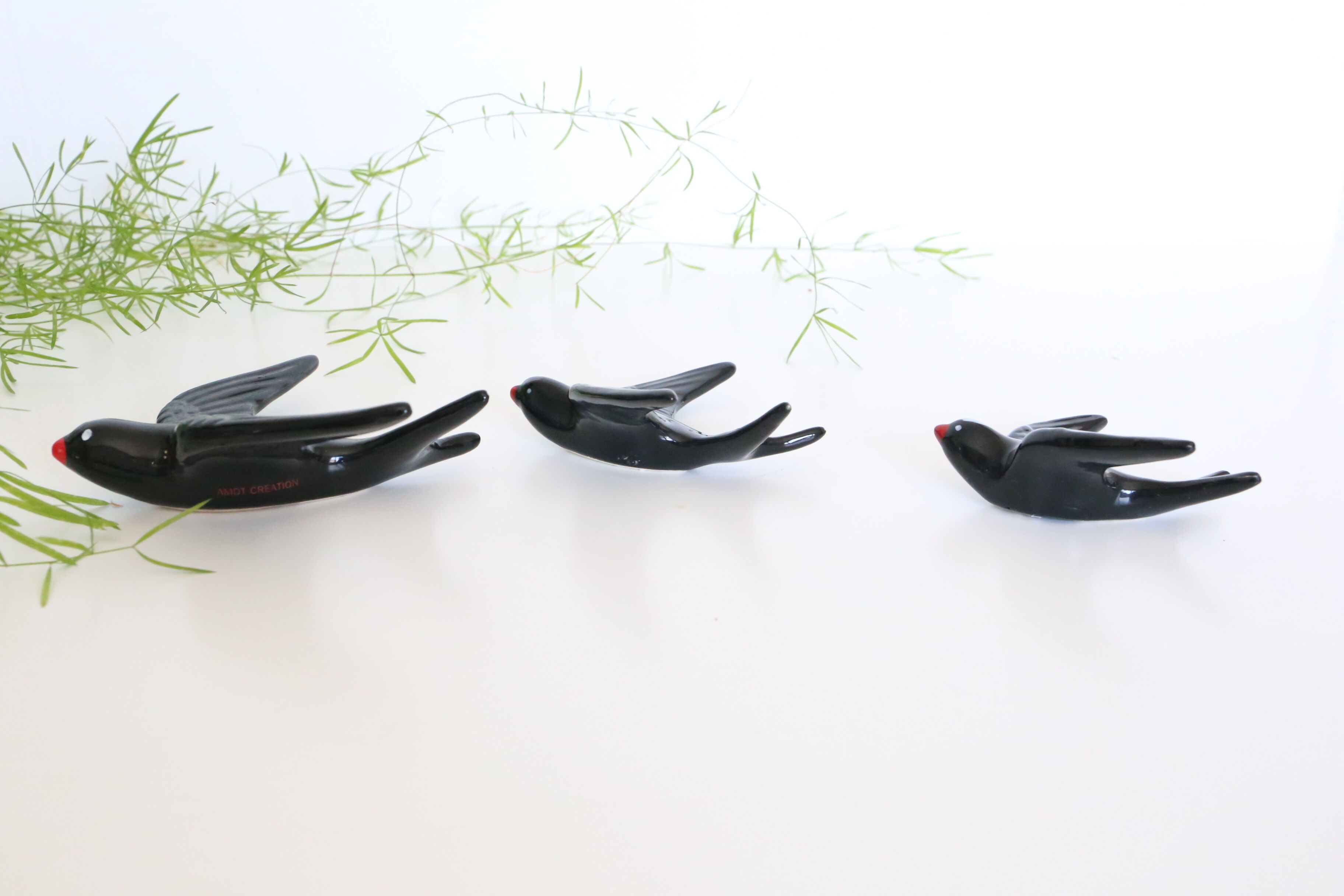 Soaring 3 ceramic swallows