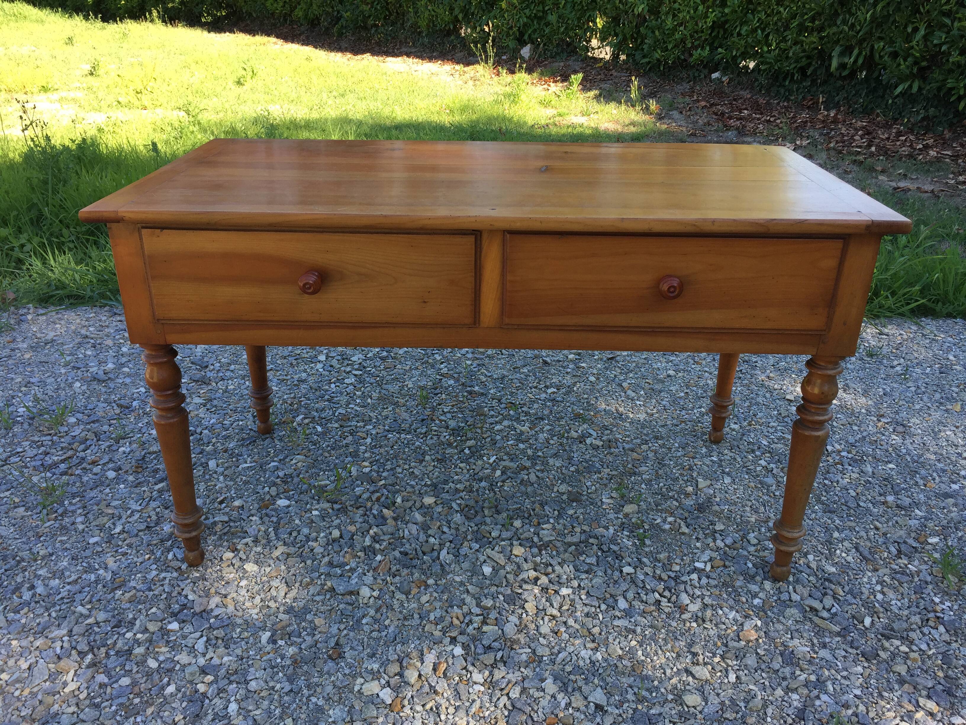 Old farmhouse table louis Philippe style in solid cherry with turned feet.