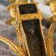 Pair of Louis XVI style wall sconces in gilded bronze, circa 1880.