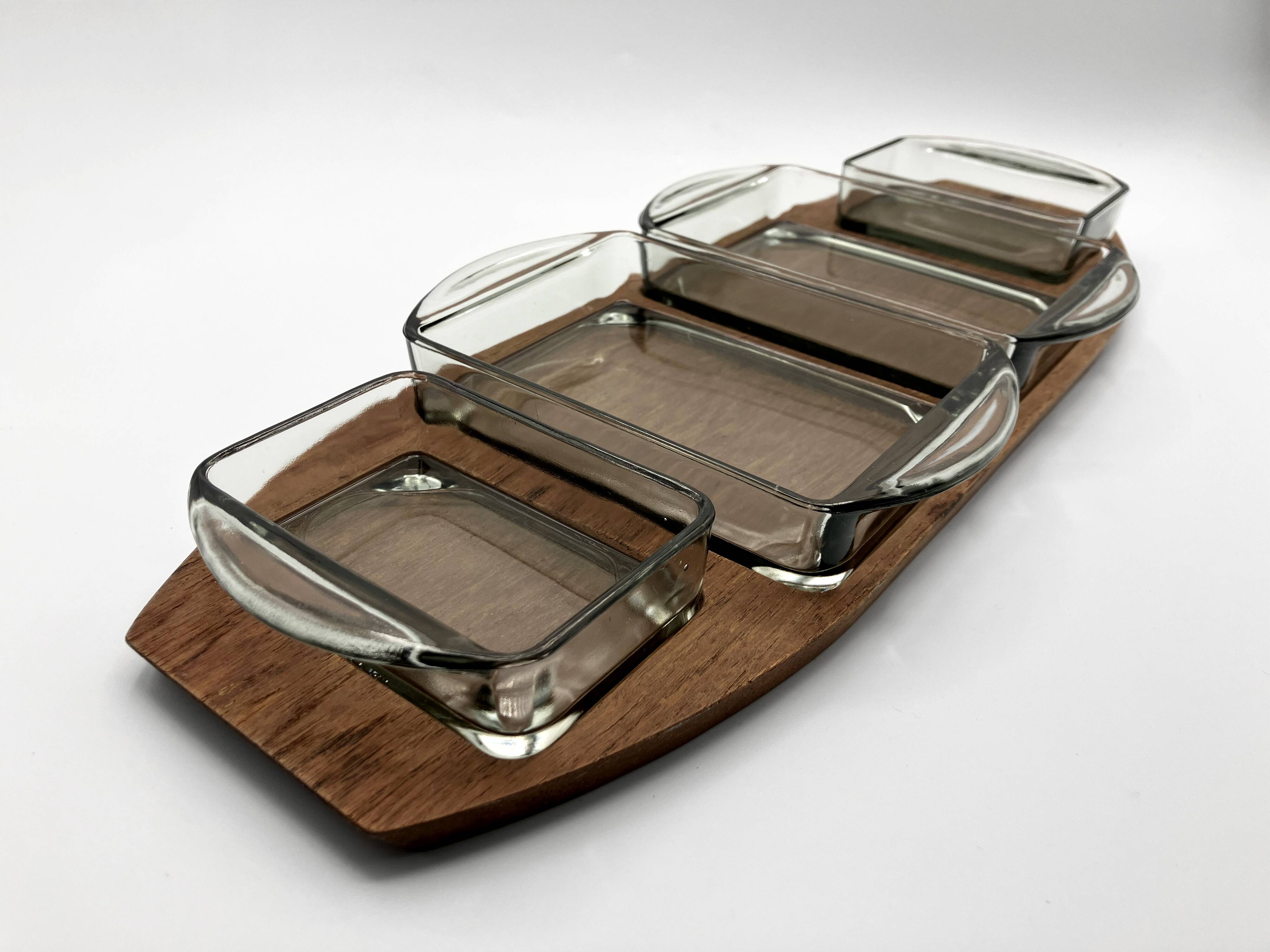 Teak tray and its 4 stackable glass dishes • Denmark • 1960