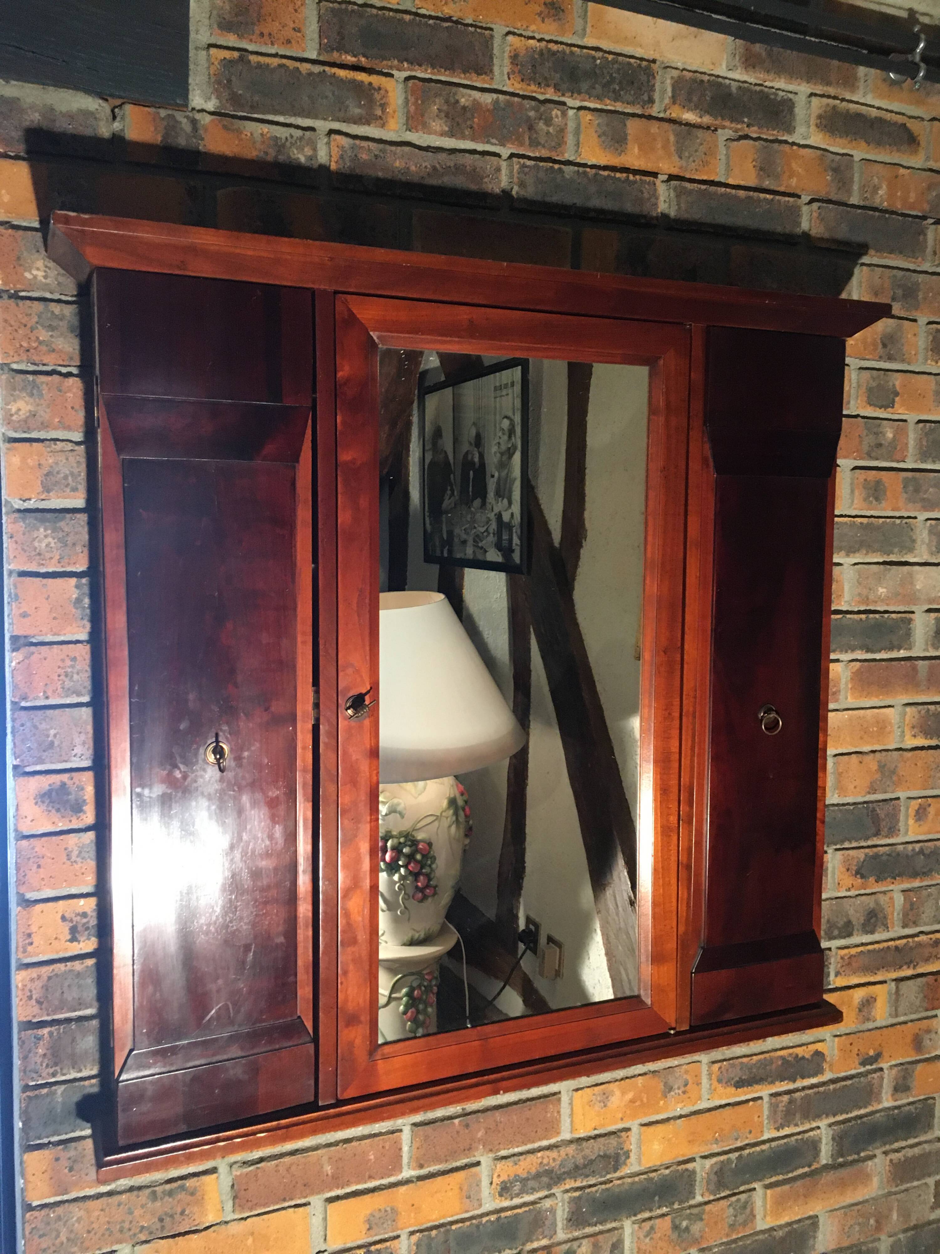 Vintage “Felix Monge” wall tie in cherry wood with mirrors