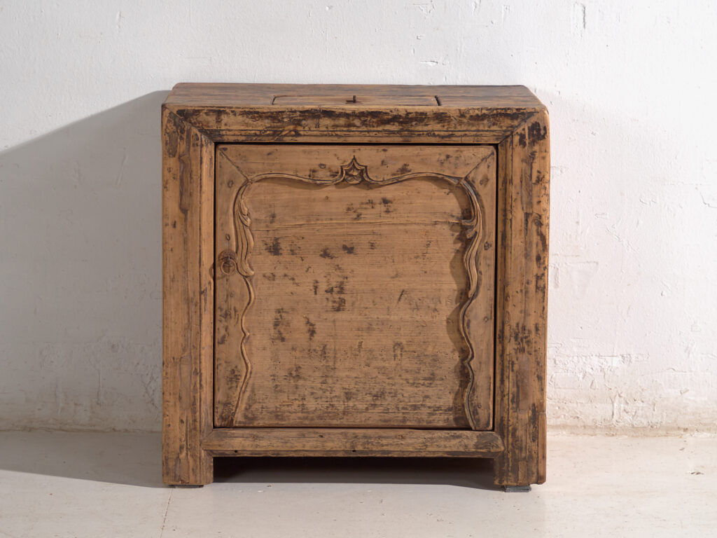 Low Shanxi cabinet in elm with carved door – China, circa 1930