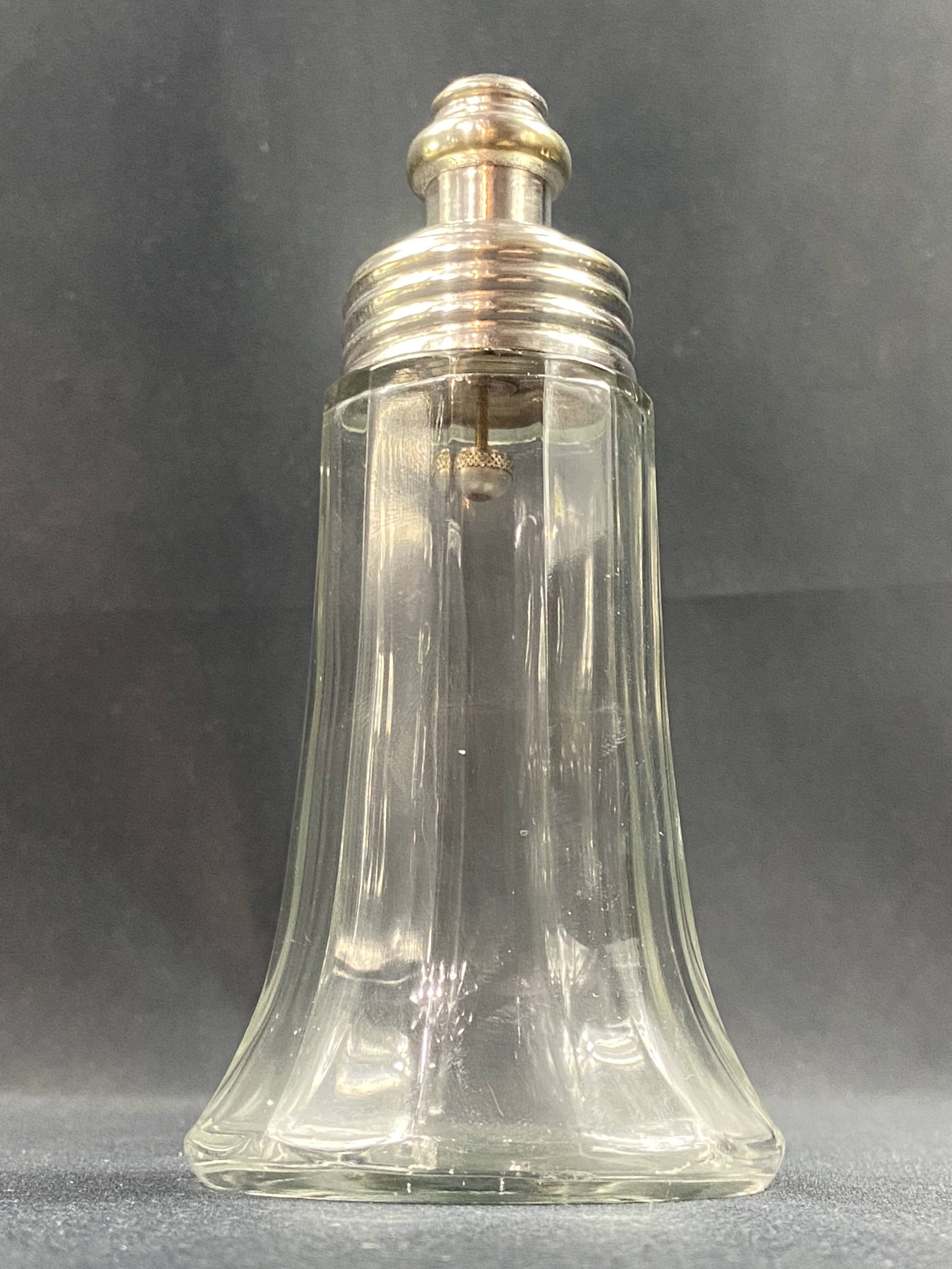 Glass and silver metal sugar shaker
