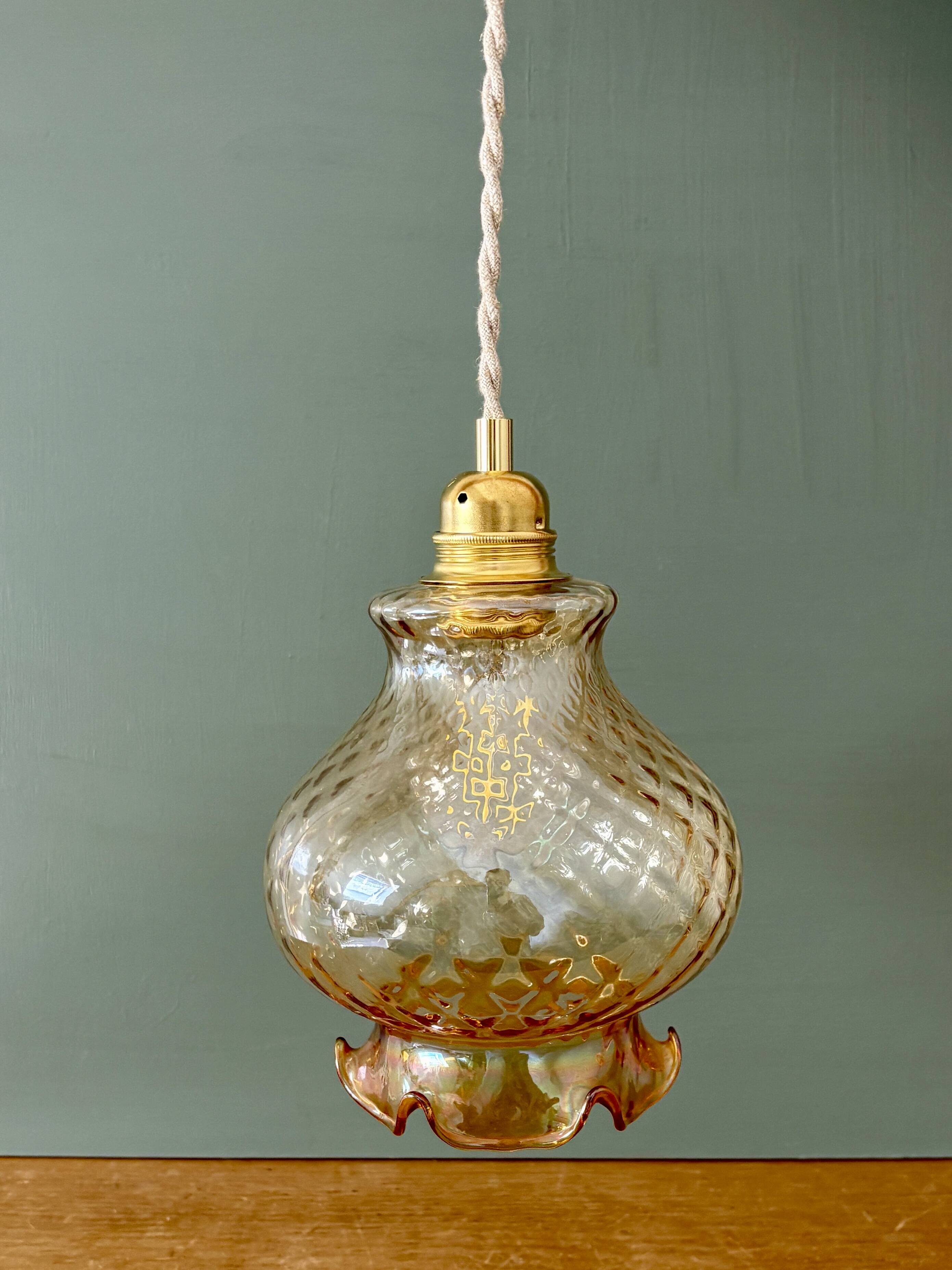 Vintage amber glass suspension globe