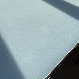 Blue Formica table for 4 to 6 people