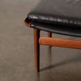 Finished Juhl armchair and its ottoman.