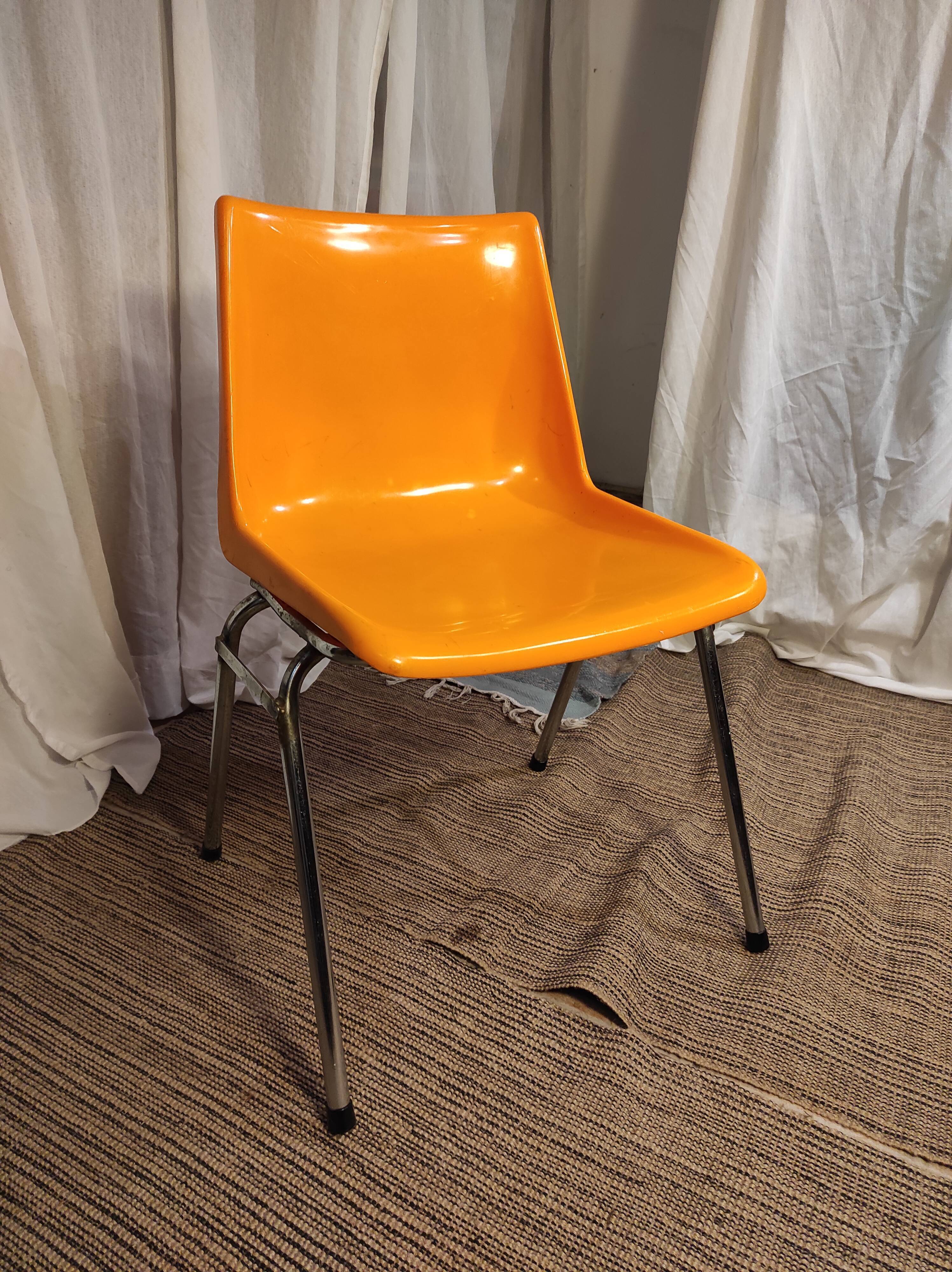 Orange plastic chair 1970