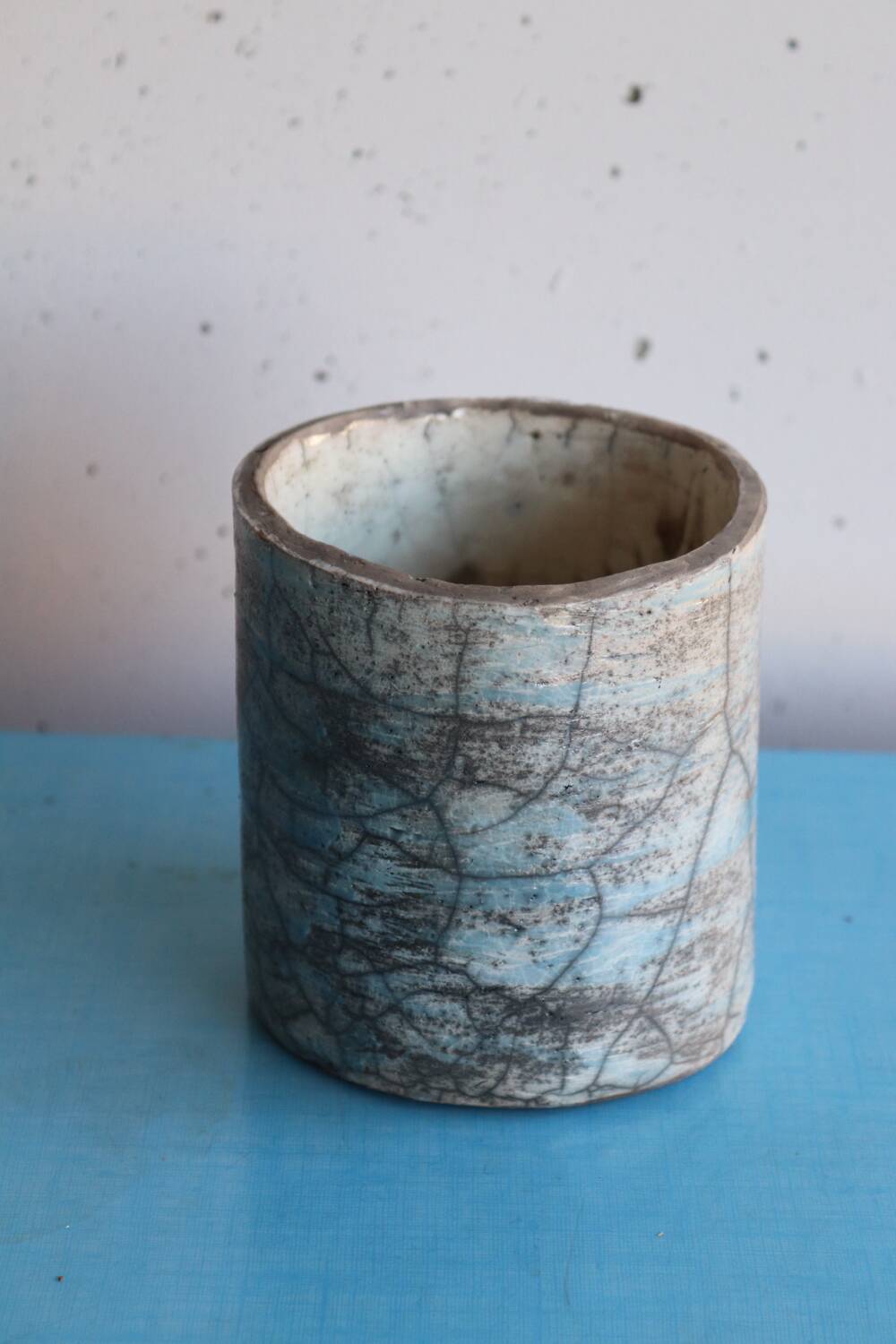 Blue raku ceramic cylindrical vase